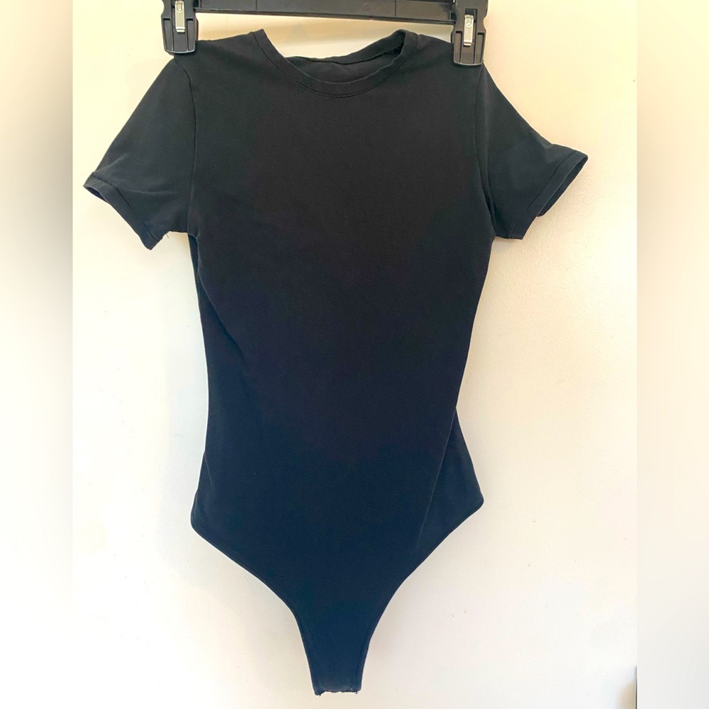 Quince black T-shirt style bodysuit with snap bottom